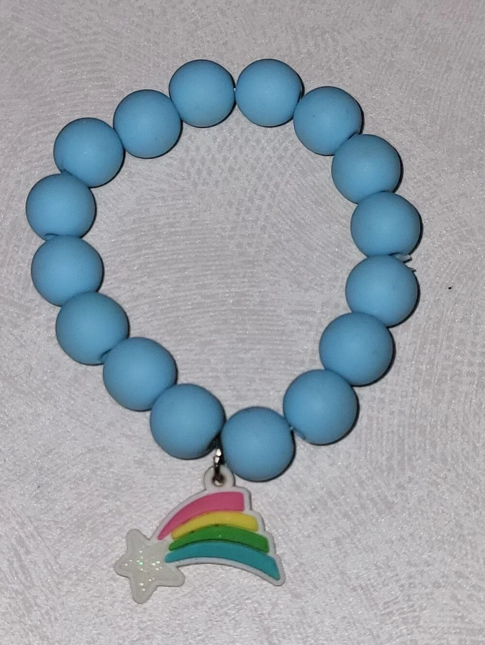 👻 Pastel Blue Beaded Stretch Bracelet with Glitter Rainbow Shooting Star Charm